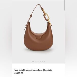 CHARLES & KEITH KORA METALLIC ACCENT MOON BAG CHOCOLATE